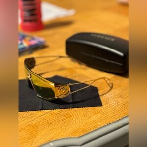 Versace Sunglasses, brand new, still with all packaging and warranty.